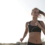 person running outdoors for heart health and cardiovascular fitness