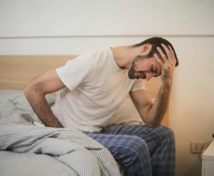 person sleeping wearing smartwatch sleep tracker monitoring rest